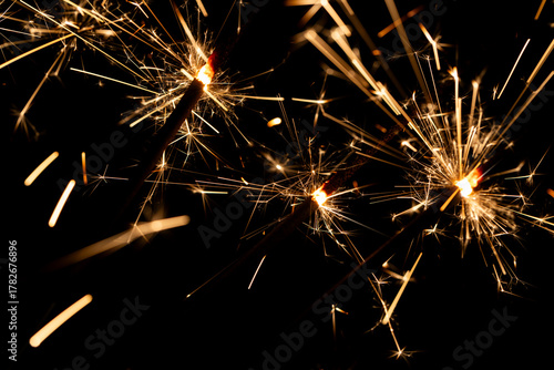 Wallpaper Mural Bright Sparklers Burning on Pure Black Background Torontodigital.ca
