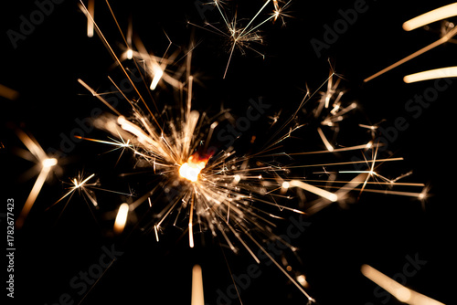 Wallpaper Mural Bright Sparklers Burning on Pure Black Background Torontodigital.ca