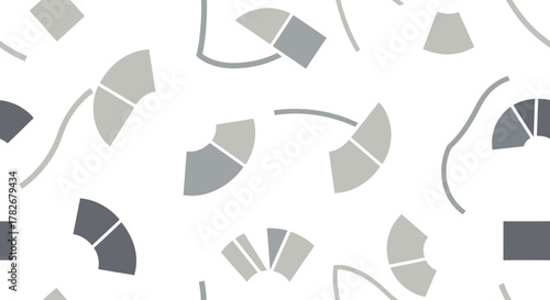 Abstract pattern of gray and light gray geometric shapes on a white background.