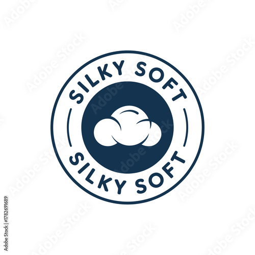 Circular badge emblem with fluffy clouds and the text silky soft
