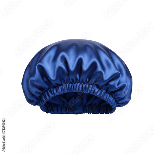 Close up studio shot of a blue satin bonnet for hair protection at night, on a clean backdrop