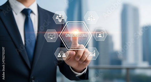 Businessman touching a digital screen with the word onboarding