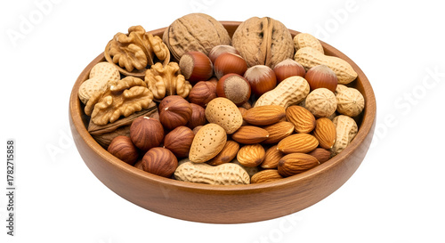 Wooden bowl filled with assorted nuts and peanuts on black background walnuts hazelnuts