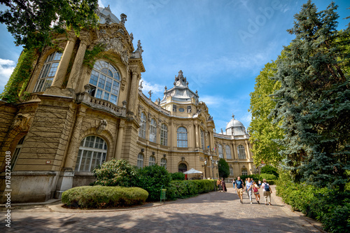 Budapest, Hungary - July 27, 2025: Exteriors and statues in front of Vajdahunyad Castle in City Park, a historic landmark showcasing various Hungarian architectural styles

