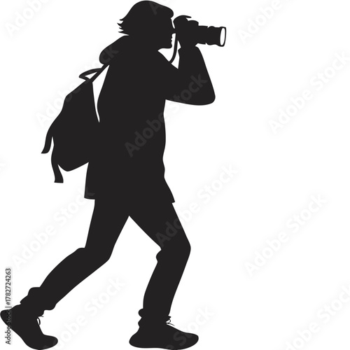 silhouette of a photographer with a camera