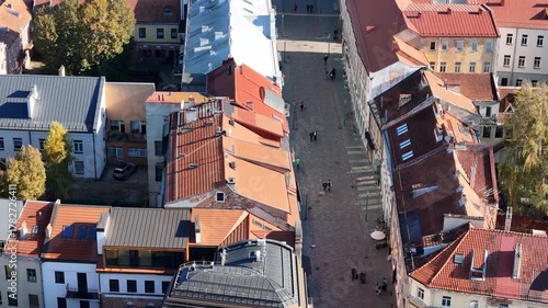 Kaunas, Lithuania – October 17, 2024: Aerial view of Kaunas Town Hall Square during renovation with paving replacement, construction workers and equipment visible in the old town public space.