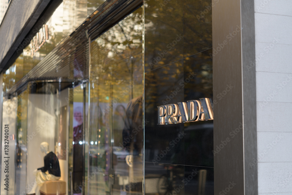 Obraz premium facade and sign outside Prada, a clothing store, located at 131 Bloor St W, Unit 105, Floor 1, The Colonnade on Bloor, Toronto
