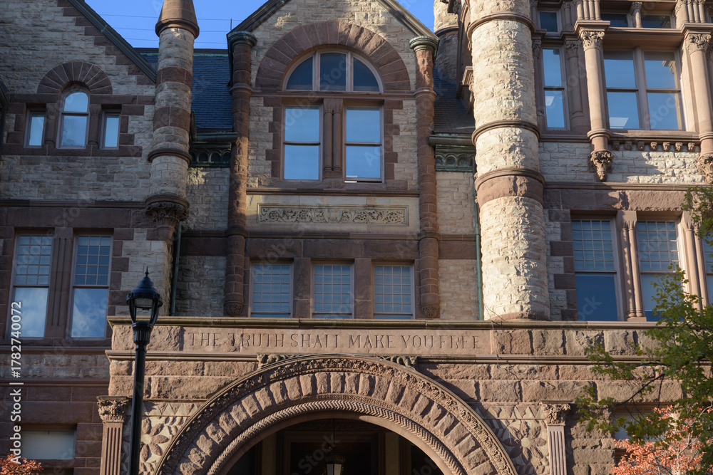 Obraz premium exterior of Victoria College, designed by William G Storm, in Richardsonian Romanesque, completed 1892, located at 73 Queen's Park Cres E, University of Toronto