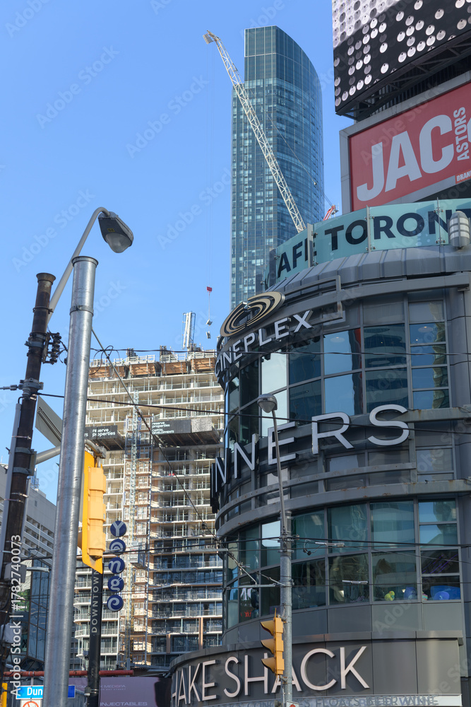 Obraz premium looking north from Sankofa Square to The Tenor, a shopping mall at 10 Dundas St E (location of Shake Shack, Winners, Cineplex, Jack's) to construction site, Toronto