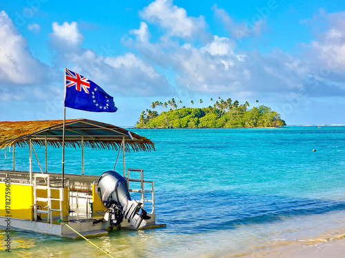 Muri Lagoon with Tourist Boat and Cook Islands Flag