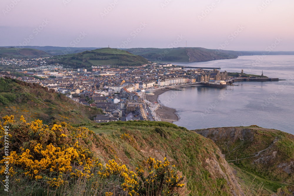 Fototapeta premium Sunset view of Aberystwyth from a nearby hill.