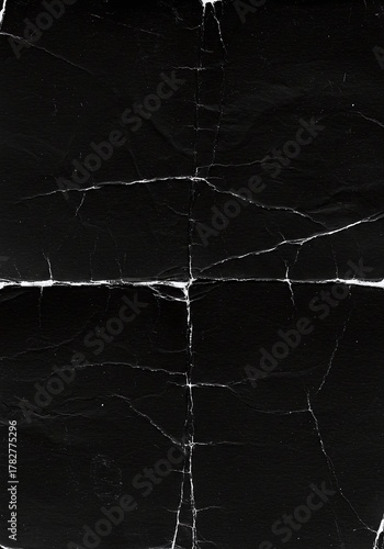 Abstract Background: Dark, Crumpled Surface with Strong White Crease Lines and Scratches