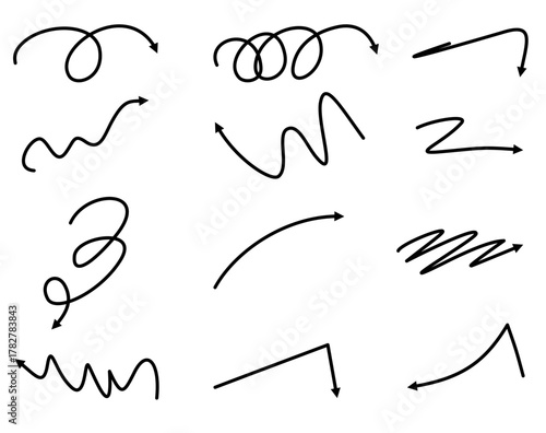 Hand drawn set of scribble curly and wavy black arrows. Collection of sketch doodle pointers showing direction and movement
