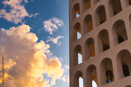 View of the Palazzo della Civiltà Italiana, also known as the Square Colosseum, in the EUR district of Rome, Italy. Sunset