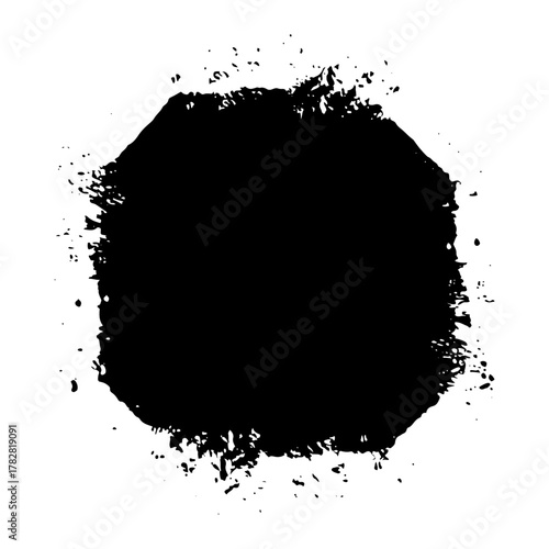 Artistic black paint splash on a white background showcasing creativity and texture in modern design