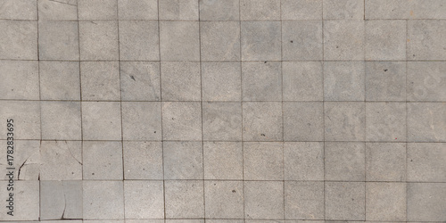 top view of the surface of a pedestrian path with paving slabs