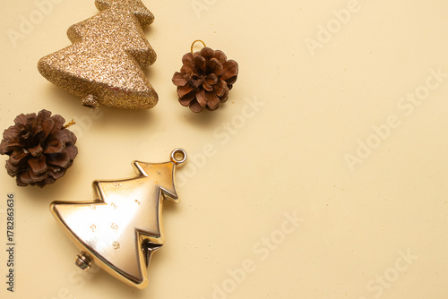 Golden Christmas ornaments on a colorful background