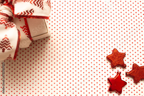 Christmas gift box on a colorful background