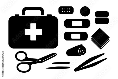 Basic first aid kit essentials: bandages, scissors, and tweezers for emergency preparedness.