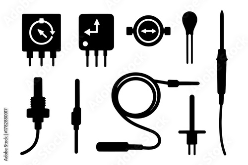 Silhouette of various electronic components and connectors in black and white.