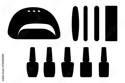 Silhouette of nail care tools including lamp, files, and polish bottles.