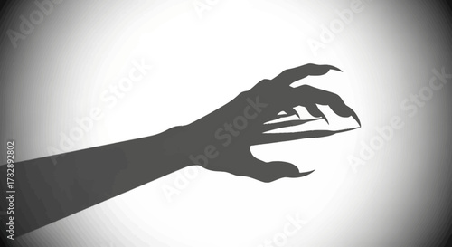 Shadow of a monstrous clawed hand reaching out.