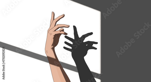 Hand casting shadow on wall creating interesting shapes and forms.