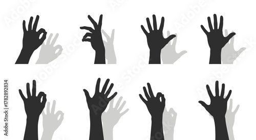 Collection of human hands creating various shadow puppet gestures on a white background.