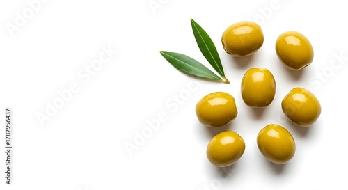 Fresh green olives with leaves on white background