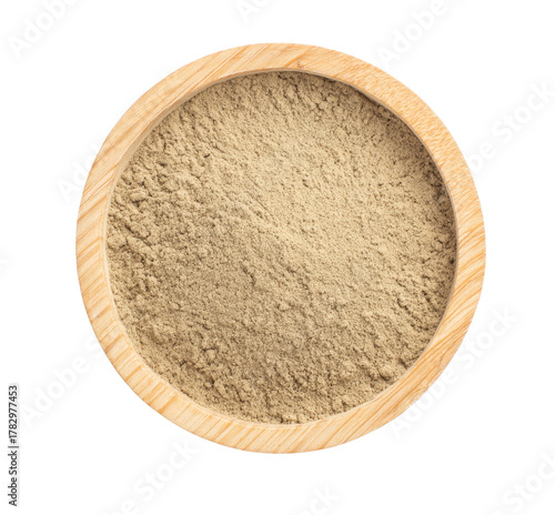 white pepper powder in wooden bowl, top view.