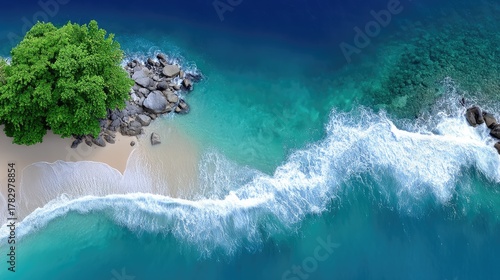 Aerial View Of A Lush Green Tropical Island With White Sand Beach Turquoise Ocean And Crashing Waves During Daytime