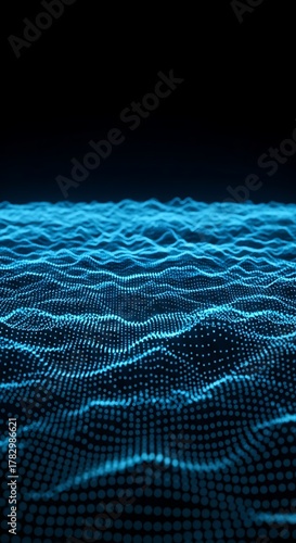 Abstract digital ocean waves made of glowing blue particles on a dark background, representing data flow and connectivity