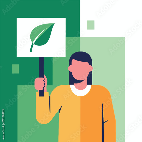 Woman Holding Leaf Sign Advocating Environmental Protection.