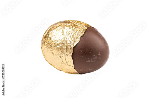 Valokuva Golden foiled chocolate egg partially unwrapped for display