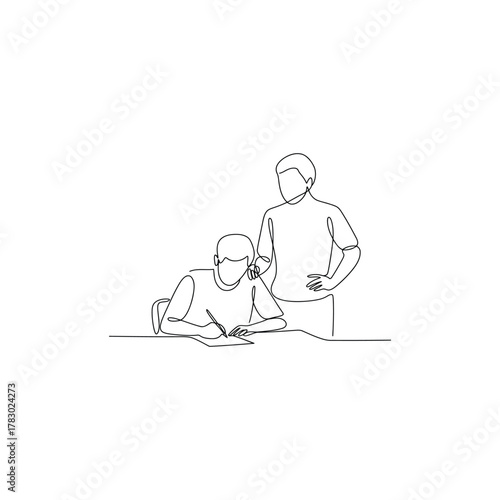 Two people one sitting one standing looking down at something