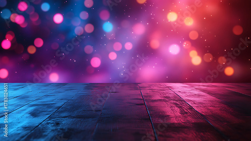 Wooden surface under vivid pink and blue bokeh lights glowing nighttime festive celebration backdrop