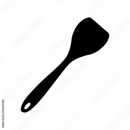 Black silhouette of a kitchen spatula on a clean white background