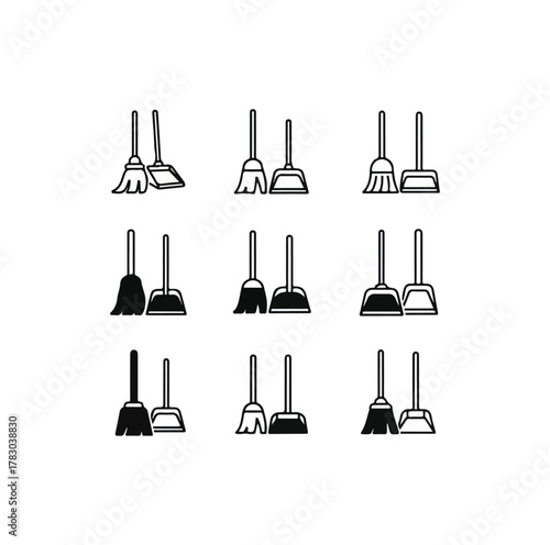 Broom and dustpan set silhouettes isolated on black