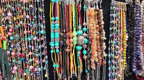 Colorful handmade jewelry at local market in summer