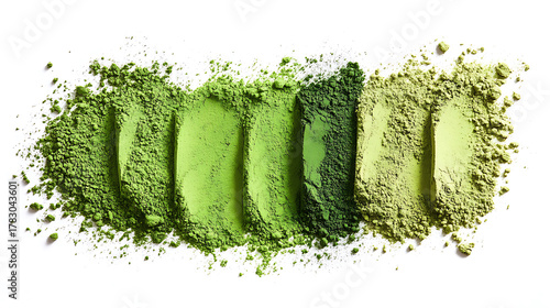 Vibrant green matcha powder displayed in textured strips on white backdrop revealing color variations and ingredient closeup for culinary and wellness applications