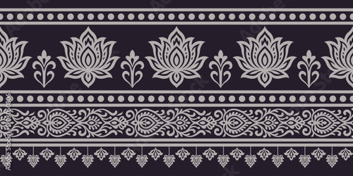 Floral ornamental border with lotus motifs and intricate decorative patterns in gray on black background, elegant and symmetrical design