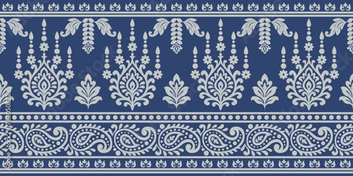 Traditional floral pattern with paisley and leaf motifs in blue and white, creating elegant and classic ornamental design