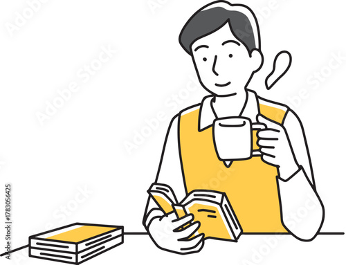 珈琲を飲みながら読書する男性