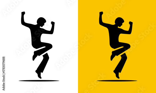 Dynamic silhouette of a person celebrating with arms raised in joyful exuberance
