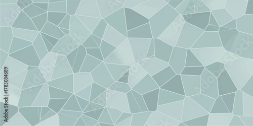 Abstract mosaic pattern with irregular shapes and various shades.