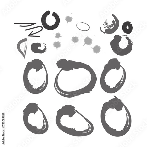 This image features a collection of abstract, brushstroke-like shapes and elements in shades of grey on a white background. There are several large, circular or oval forms, some incomplete, and smalle