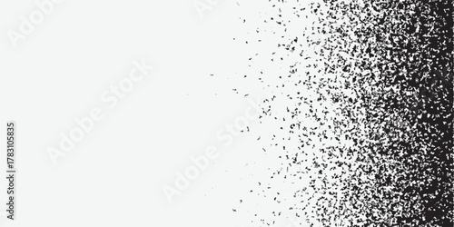 Fading grain dotted background. Sprayed grunge noise surface. Black dots, speckles, particles specks, dust, dots wallpaper. Subtle halftone gritty sand overlay. Vector background