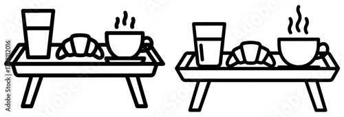 Two breakfast trays with croissant, cup of coffee and glass of juice morning meal on a tray