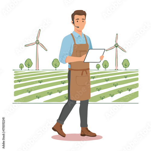 Agricultural Worker Inspecting Tablet in a Wind Turbine Field.