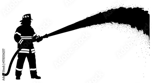Brave firefighter bravely battling flames with powerful water hose in dramatic silhouette, perfect for safety campaigns or emergency services advertising